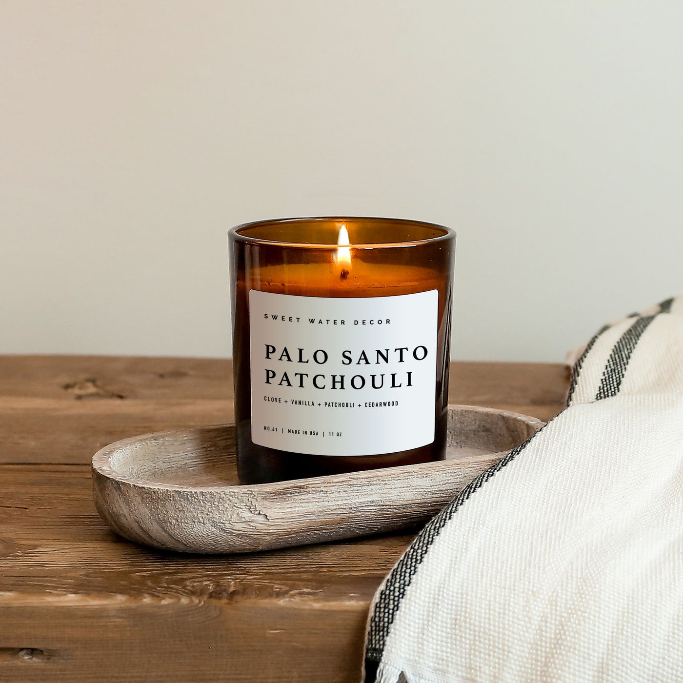 Palo Santo Patchouli Soy Candle - Amber Jar - 11 oz